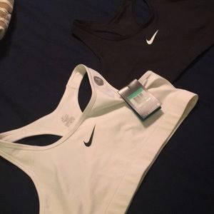 Two Nike sports bras. Never been worn!